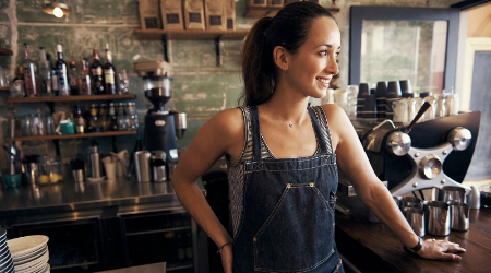 Woman working in coffee bar