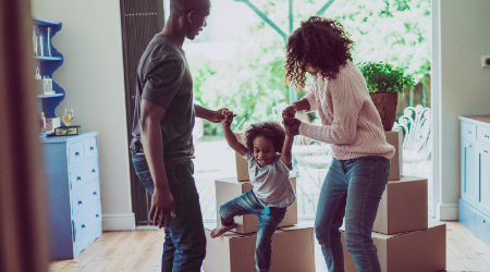 Playful family with son in new house