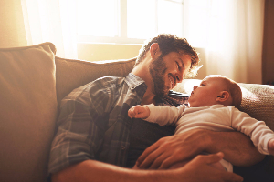 Man holding infant