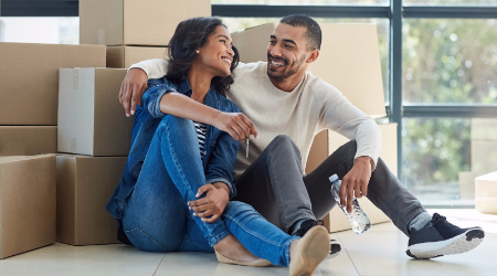 Couple with moving boxes