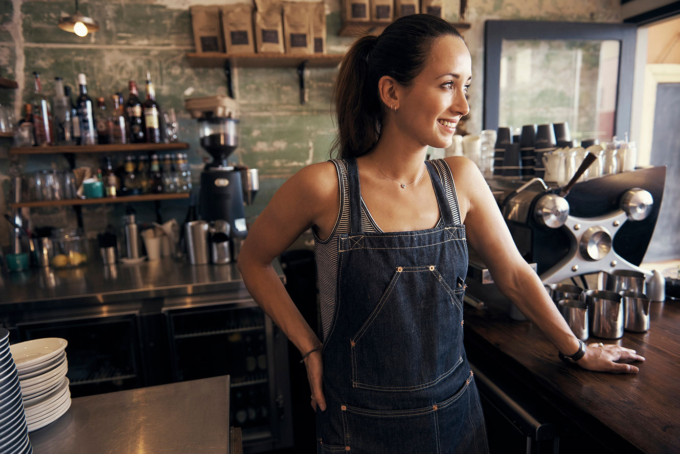 Woman working in coffee bar