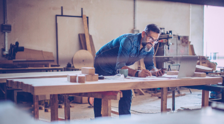 Man in wood working shop