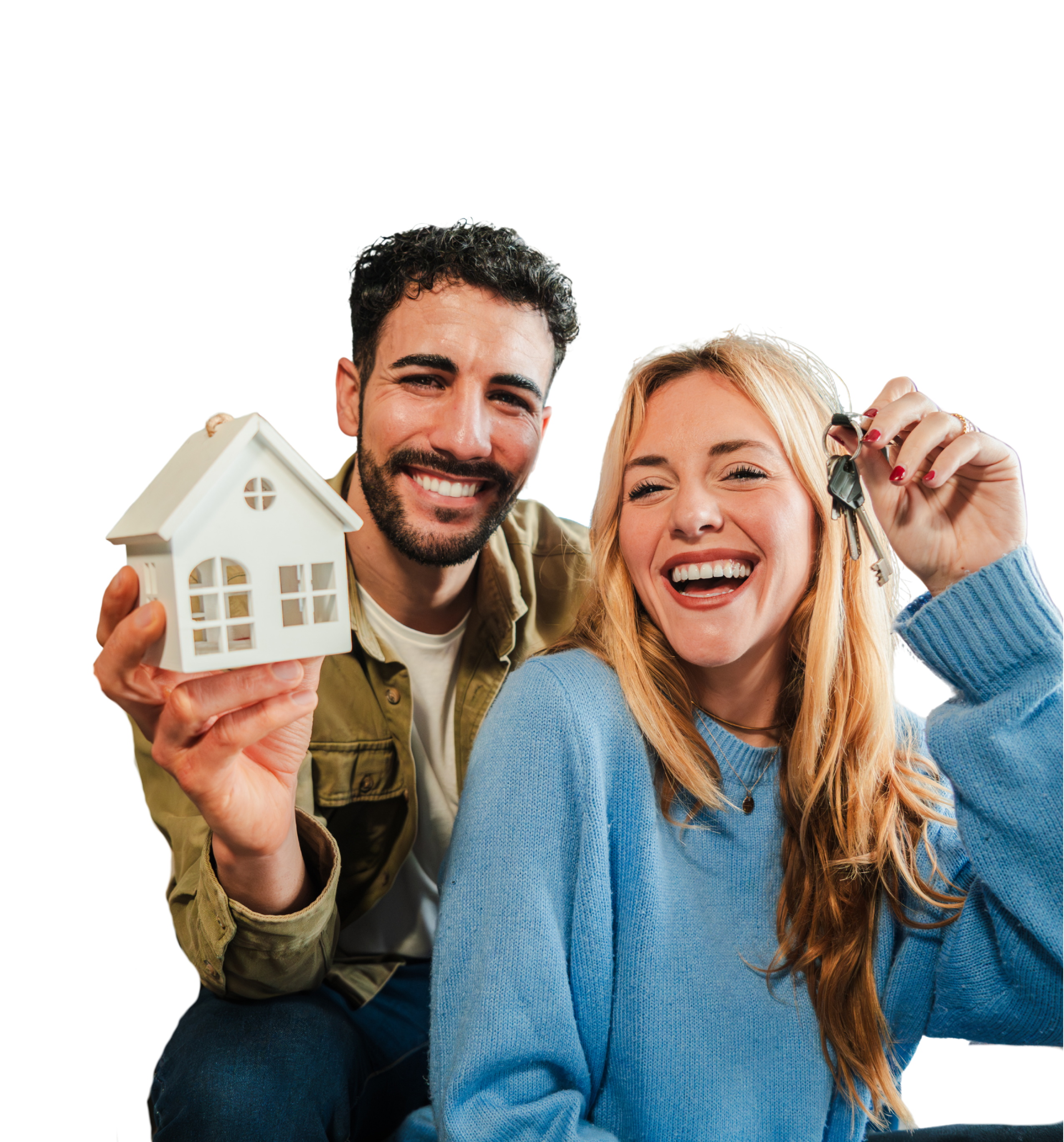 Couple holding keys to their new home and smiling