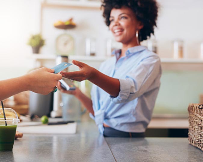 Person paying for a service with a card