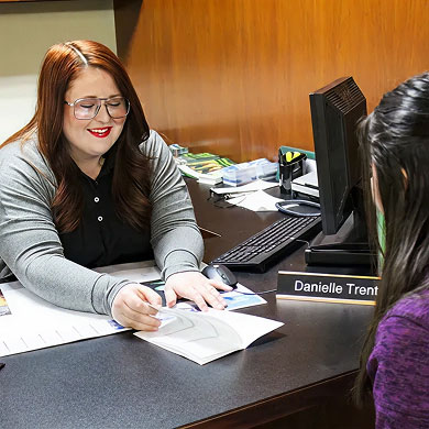 Peoples Exchange Bank Employee going over a Personal Loan