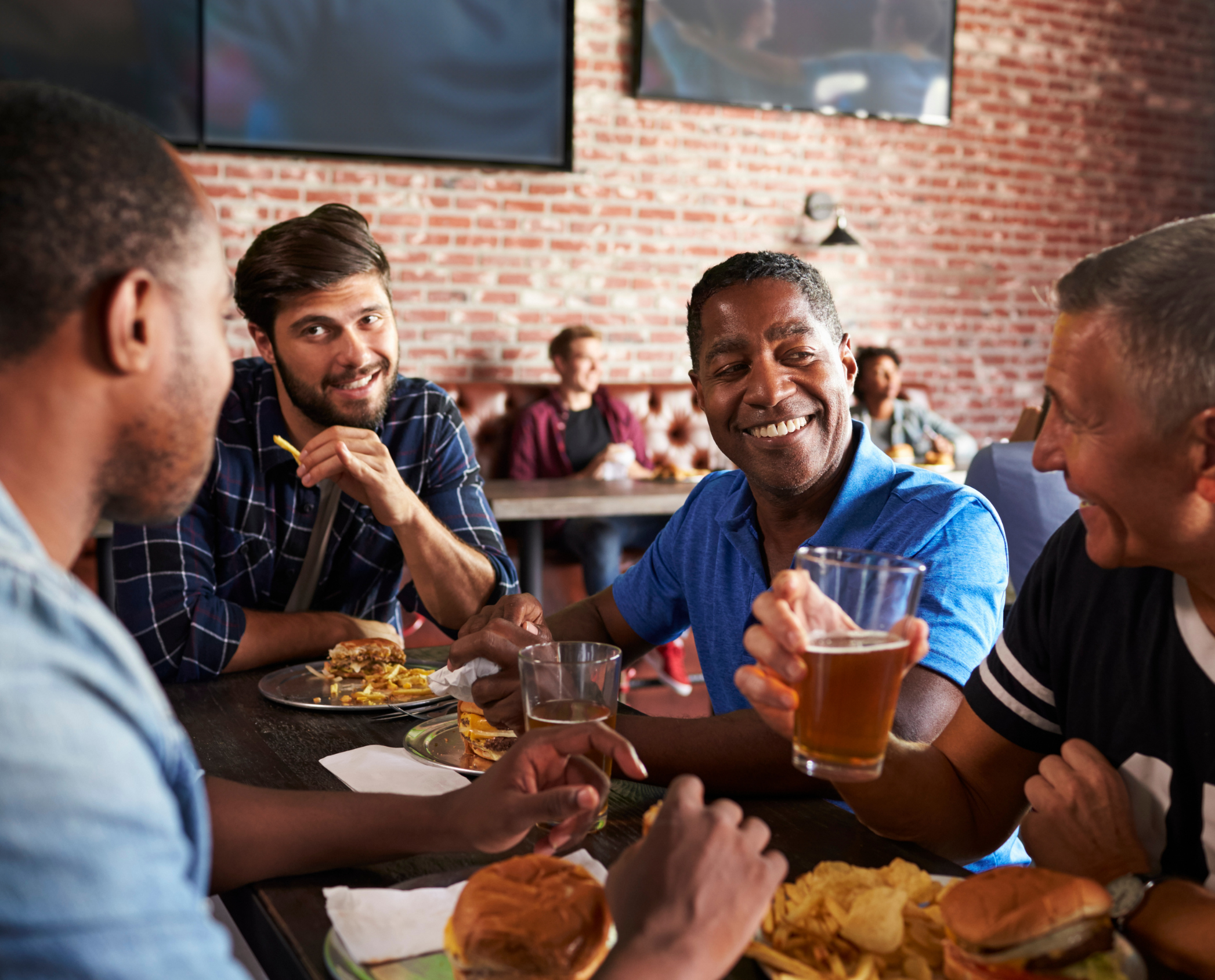 Friends eating together at a restaurant 