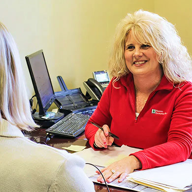 Peoples Exchange Bank Employee talking through Personal Banking